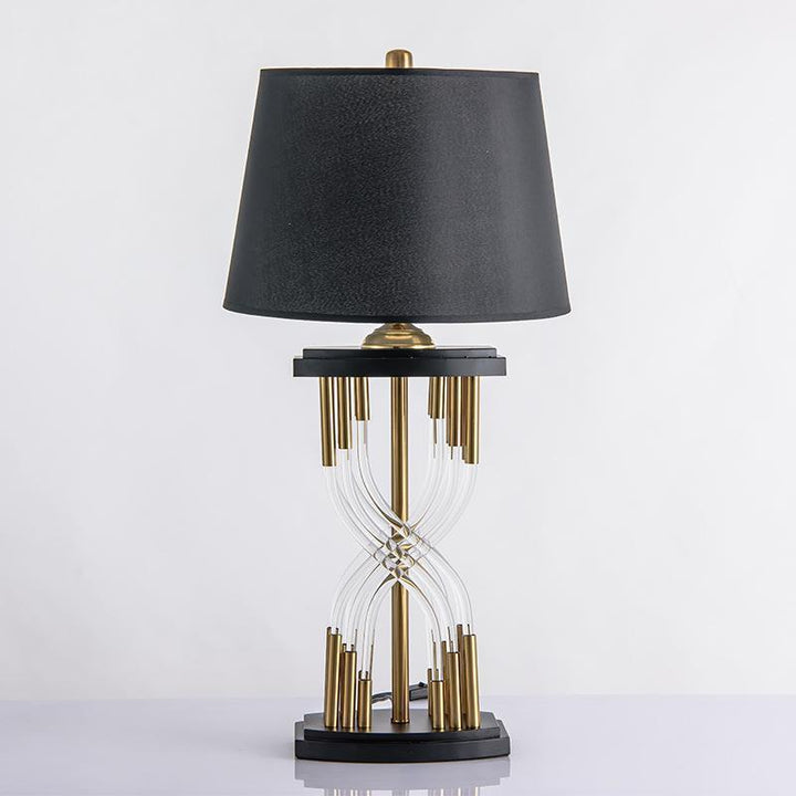 Moderne dekorative Tischlampe mit skulpturaler Basis