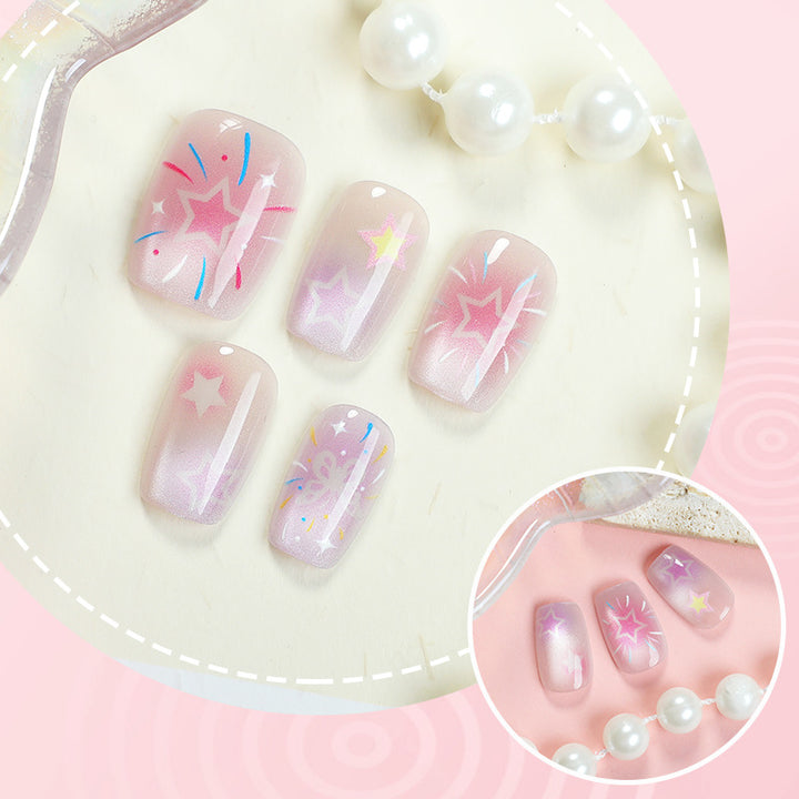 Künstlerisches Press-On-Nagelset mit himmlischen Designs