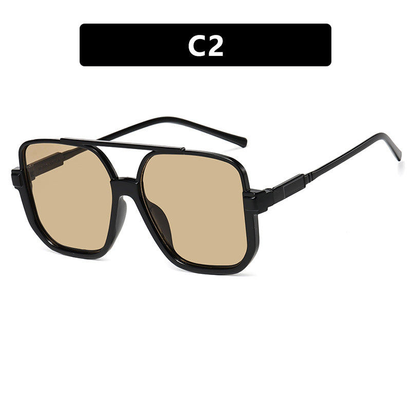Damen quadratische Sonnenbrille mit transparentem Rahmen und grün getönten Gläsern Karnz