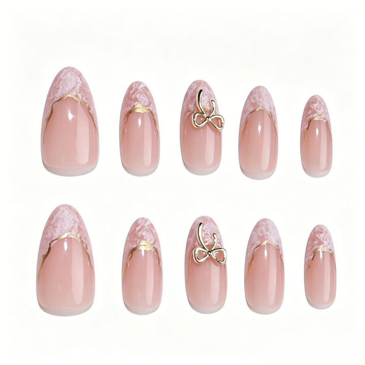 Stiletto Kunstnagelset mit eleganten goldenen Akzenten Karnz