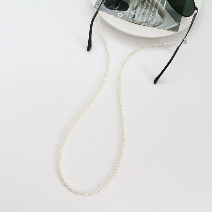 Brillenhalterungsgurt Karnz