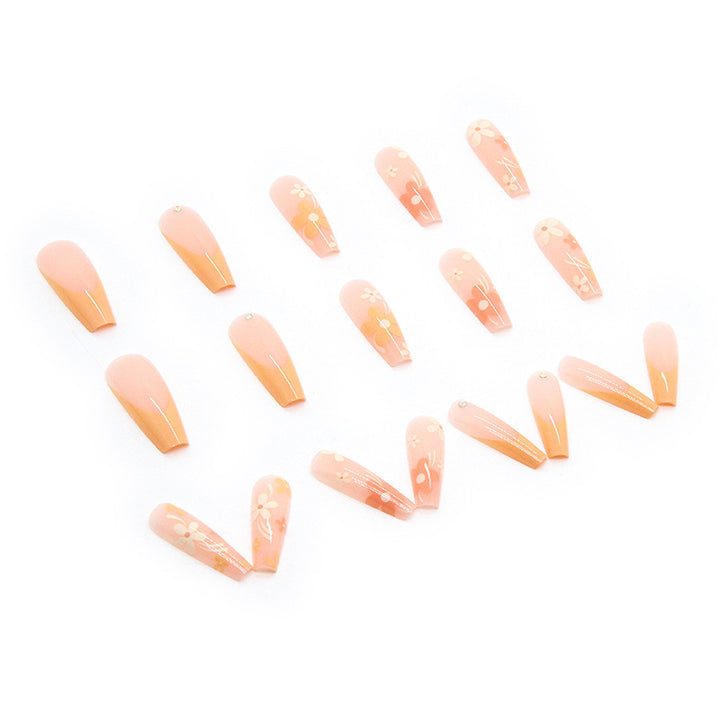 Kunstnagelset mit floralen Acrylverzierungen Karnz