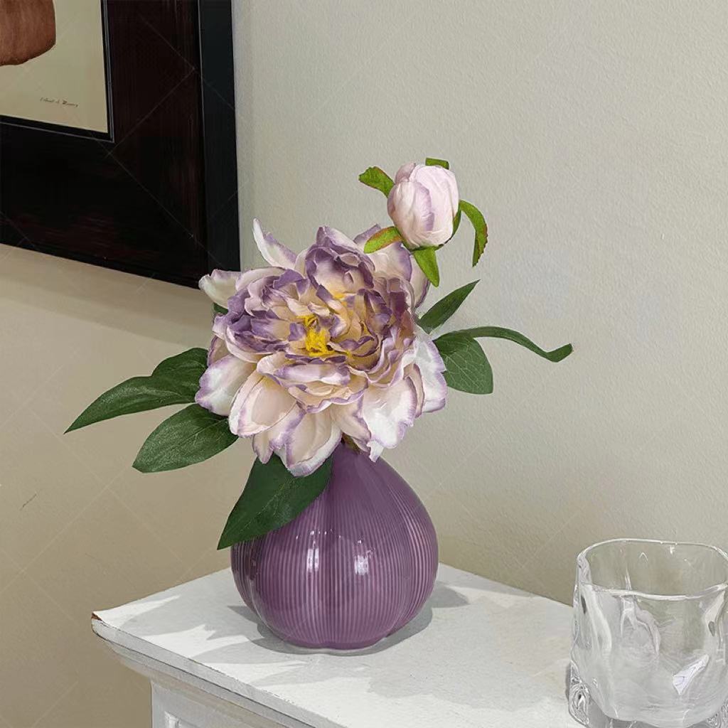 Elegante künstliche Blumenanzeige