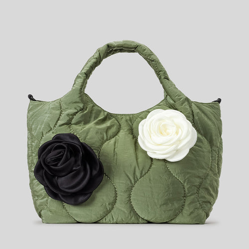 Blumengeschmückte gesteppte Handtasche