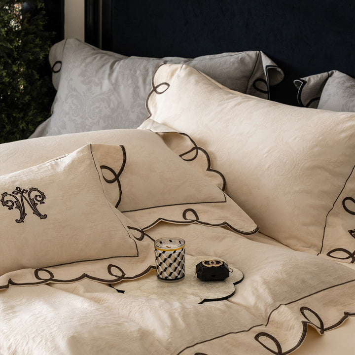 Besticktes Wellen-Loop Jacquard Bettbezug-Set mit passenden Kissenbezügen