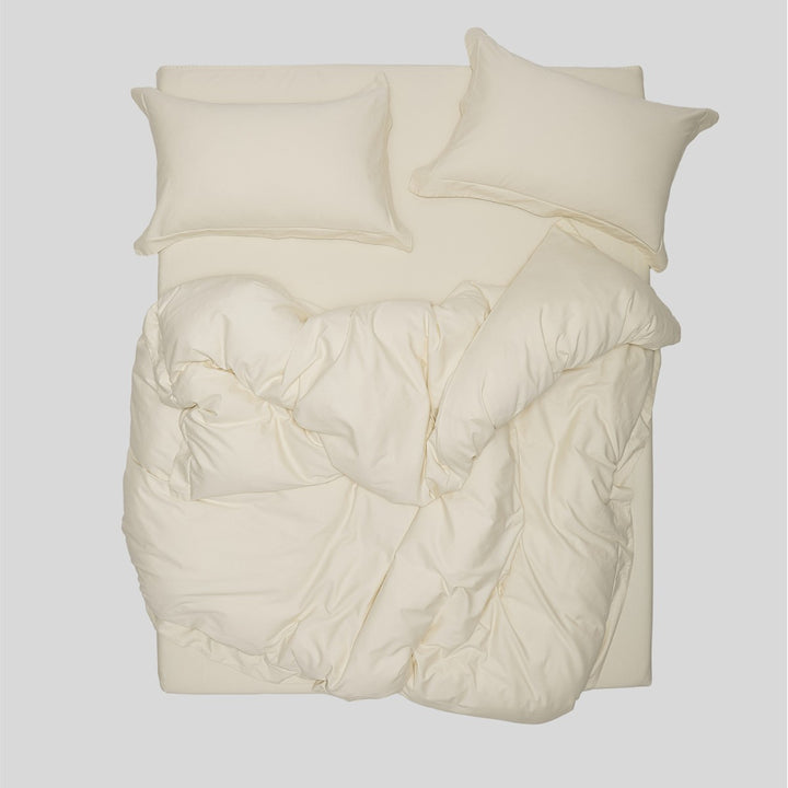 Minimalist gewaschenes gebürstetes Baumwoll-Bettwäsche-Set mit tiefem Spannbetttuch und Kissenbezügen