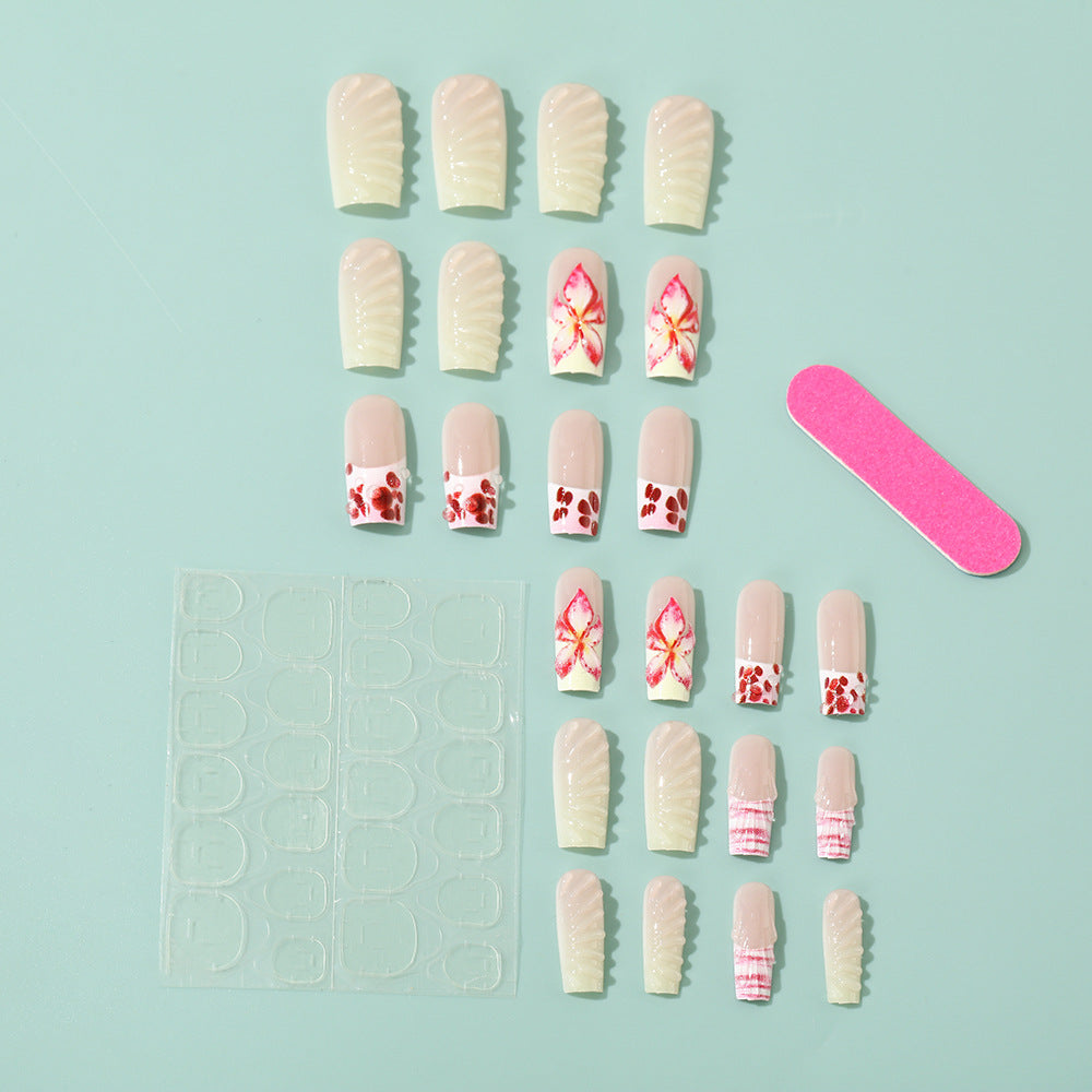 Kunstnägel Set mit eleganten floralen Designs Karnz