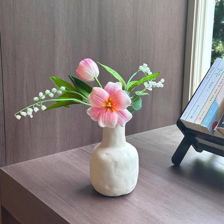 Dekorative künstliche Blumenarrangement
