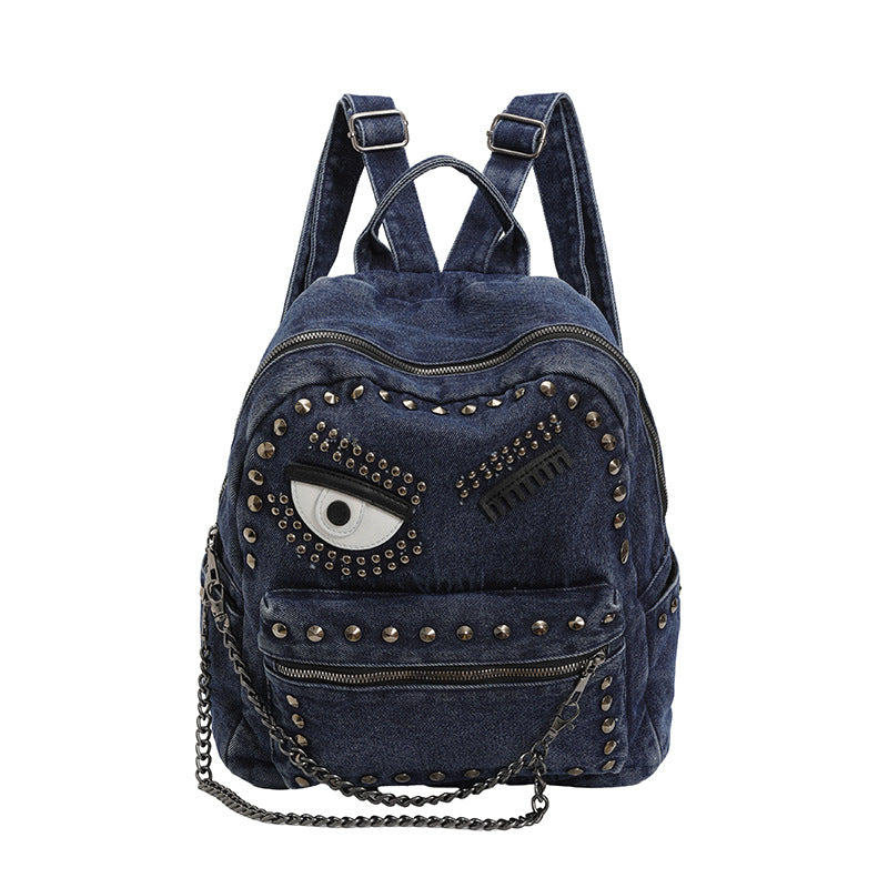 Stylischer Denim-Rucksack mit dekorativen Nieten