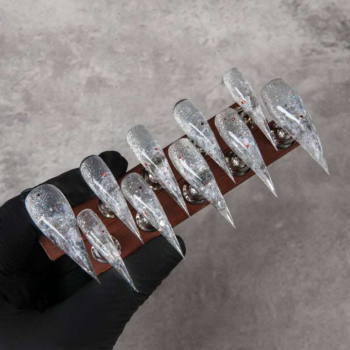 Glamouröser Stiletto Press-On Nagelset mit Glitzerelementen