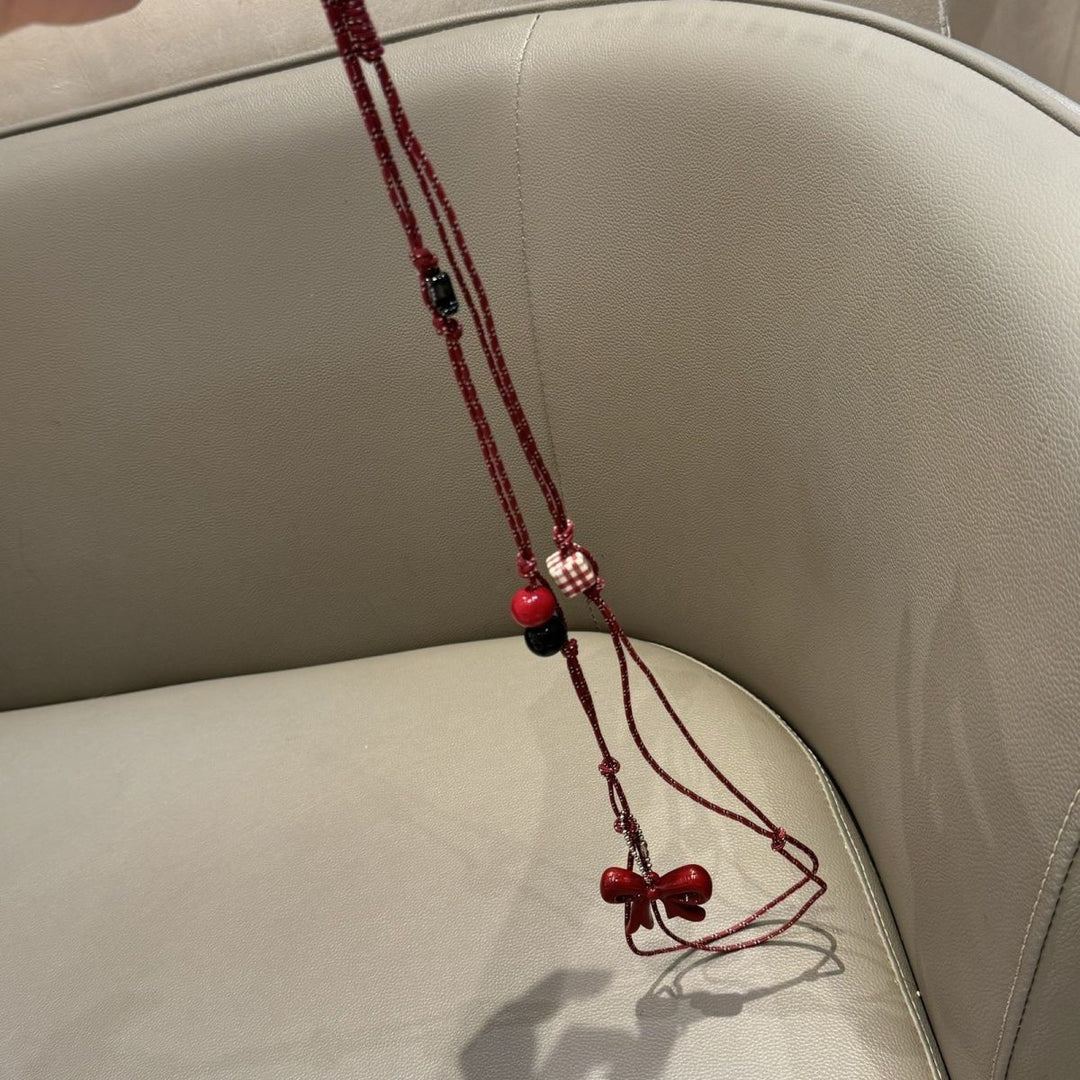 Verspielter Perlen Charm Brillenhalter Karnz