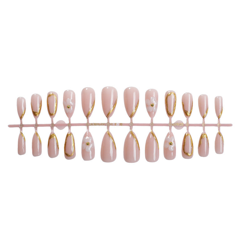 Luxuriöses Press-On Nail Art Set mit goldenen Akzenten Karnz