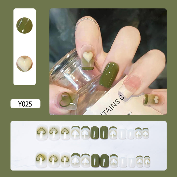 Künstlerisches Press-On-Nagelset mit Herz- und Blätterdesigns