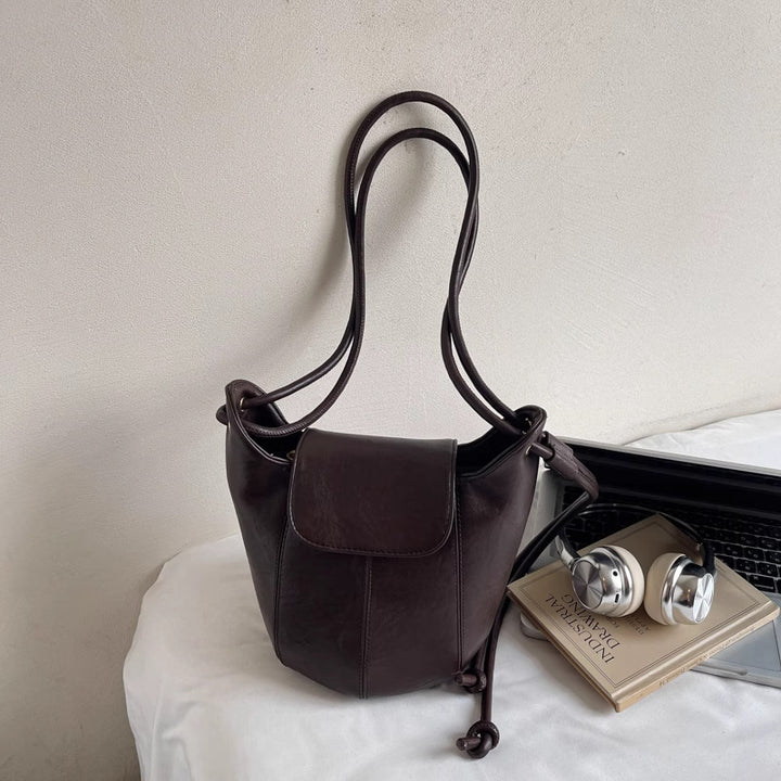 Vintage-inspirierte Leder Kordelzug Eimer Tasche Karnz