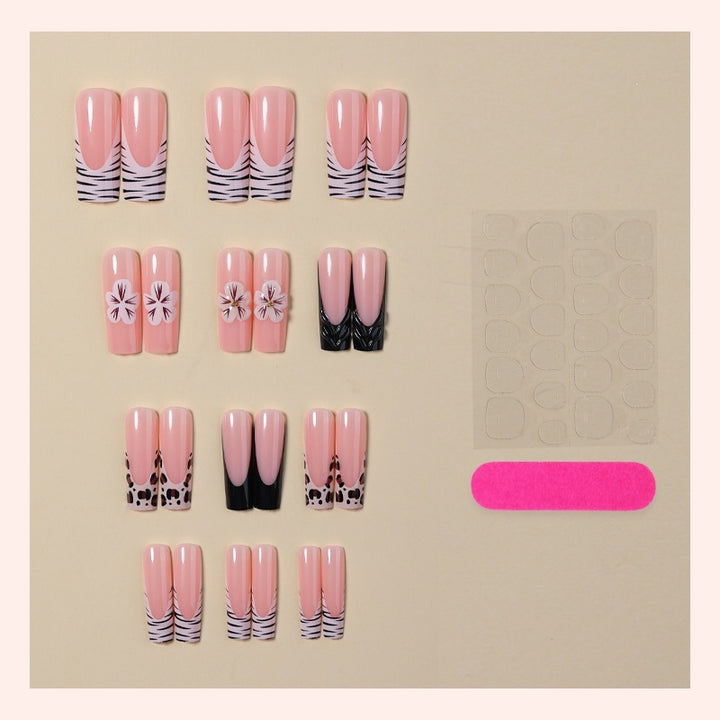 Kunstnagelset mit floralen und marmorierten Designs Karnz