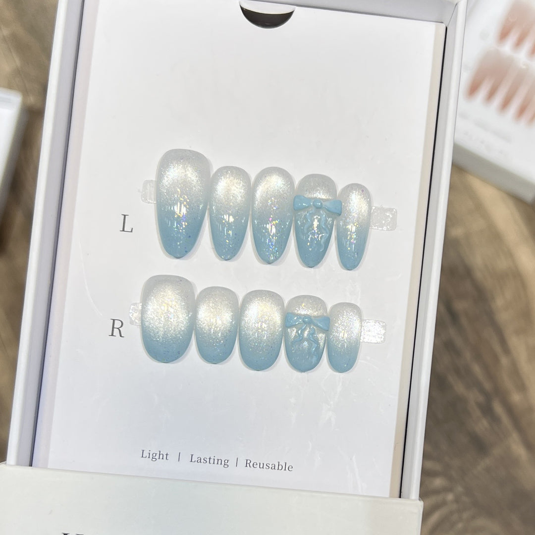 Glänzendes Press-On Nagelkunst-Set mit Schleifenakzenten Karnz