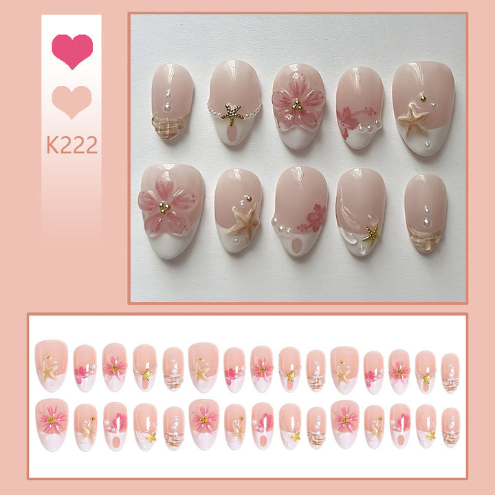 Kunstnagelset mit floralen und maritimen Designs Karnz