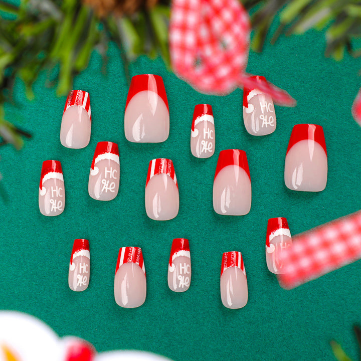 Künstliche Nagelverlängerungen im festlichen Weihnachtsdesign Karnz