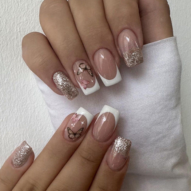 Dekorative Schmetterlings-Glitzer-Nail-Art Karnz