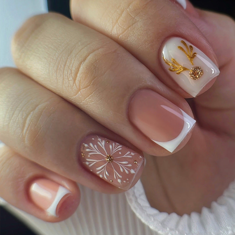 Kunstnagelset mit eleganten Weihnachtsmotiven Karnz