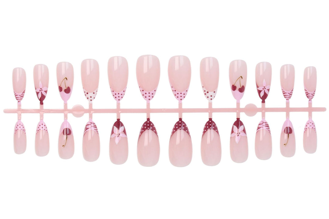 Kunstnagelset mit kreativen Blüten-, Herz- und Polka-Dots-Designs Karnz