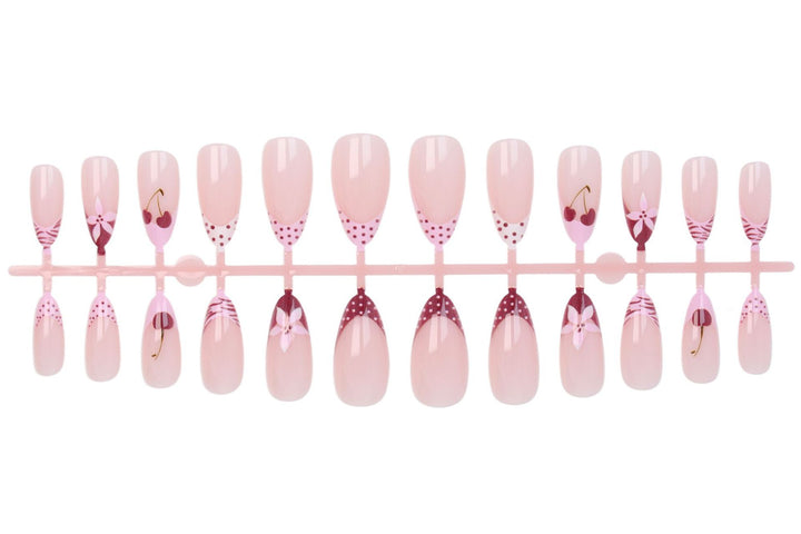Kunstnagelset mit kreativen Blüten-, Herz- und Polka-Dots-Designs Karnz