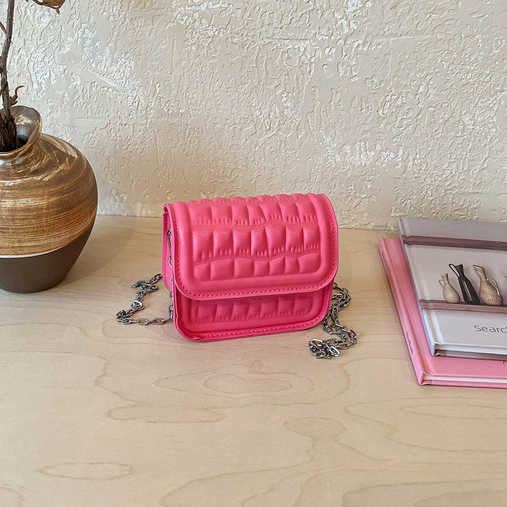 Texturiert gesteppte Mini-Crossbody-Tasche Karnz