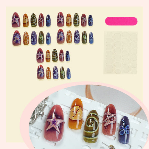 Kunstnagelset mit kreativen maritimen und naturinspirierten Motiven Karnz