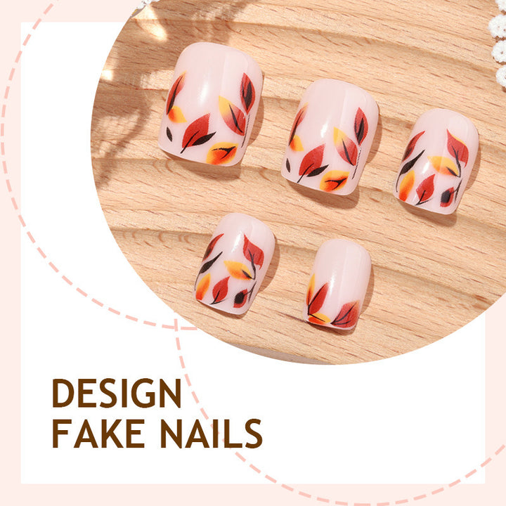 Kunstnagelset mit herbstlichen Blattformen Karnz