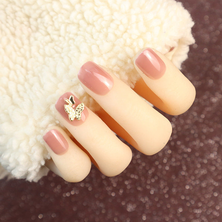 Elegantes Press-On-Nagelset mit Schmetterlingsakzenten