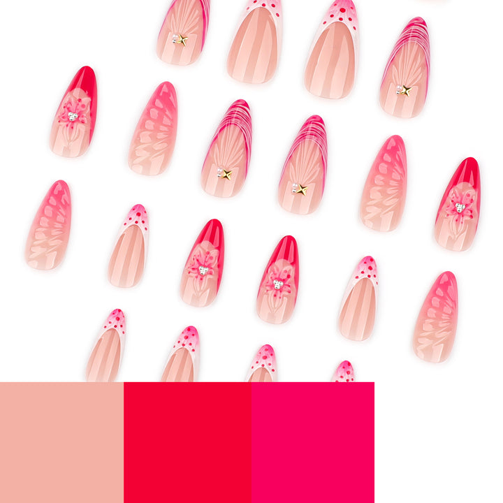 Kunstvolle Stiletto-Nägel mit floralem Design und Glitzerakzenten Karnz