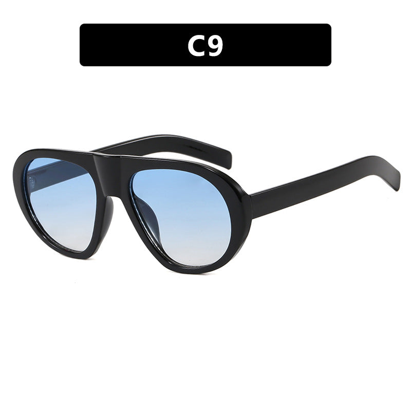 Damen auffällige Sonnenbrille mit futuristischem Rahmen und robustem Design Karnz
