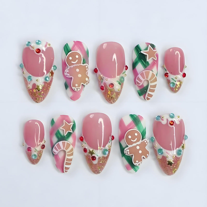 Kunstnagelset mit festlichen Weihnachtsmotiven und Glitzerakzenten Karnz