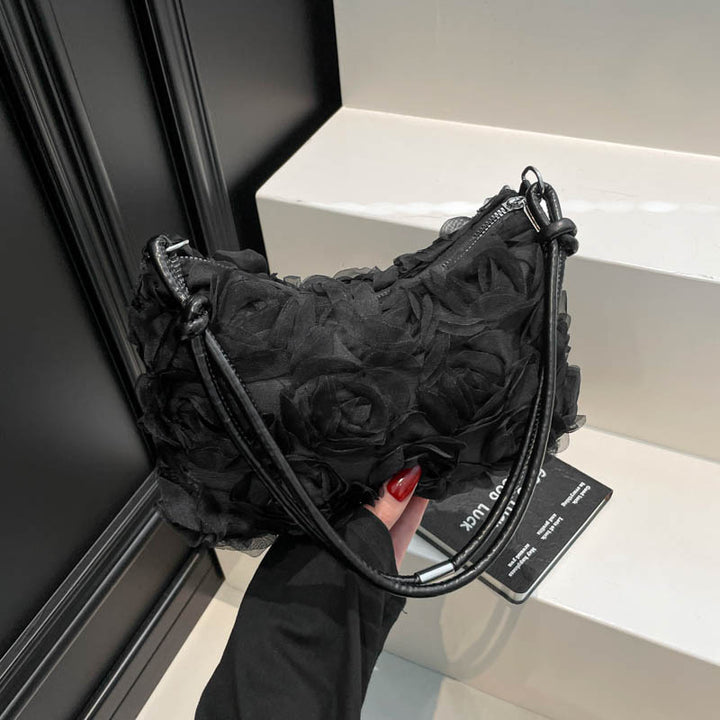 Blumenverzierte Handtasche