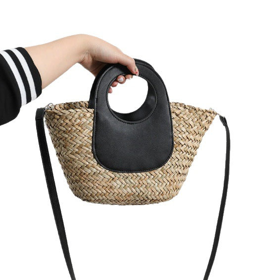 Damen Handtasche aus geflochtenem Material mit Lederdetails Karnz