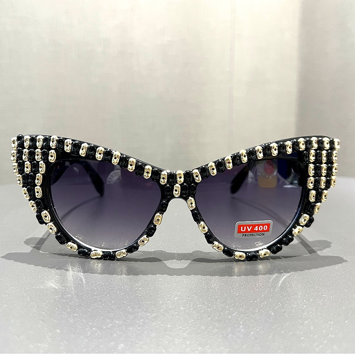 Damen Cat-Eye Sonnenbrille mit farblich akzentuiertem Rahmen Karnz