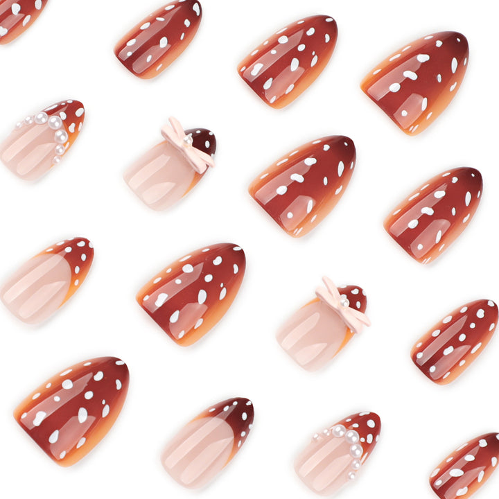 Künstliche Nagelkunst mit Punktmuster und Schleifenakzenten Karnz