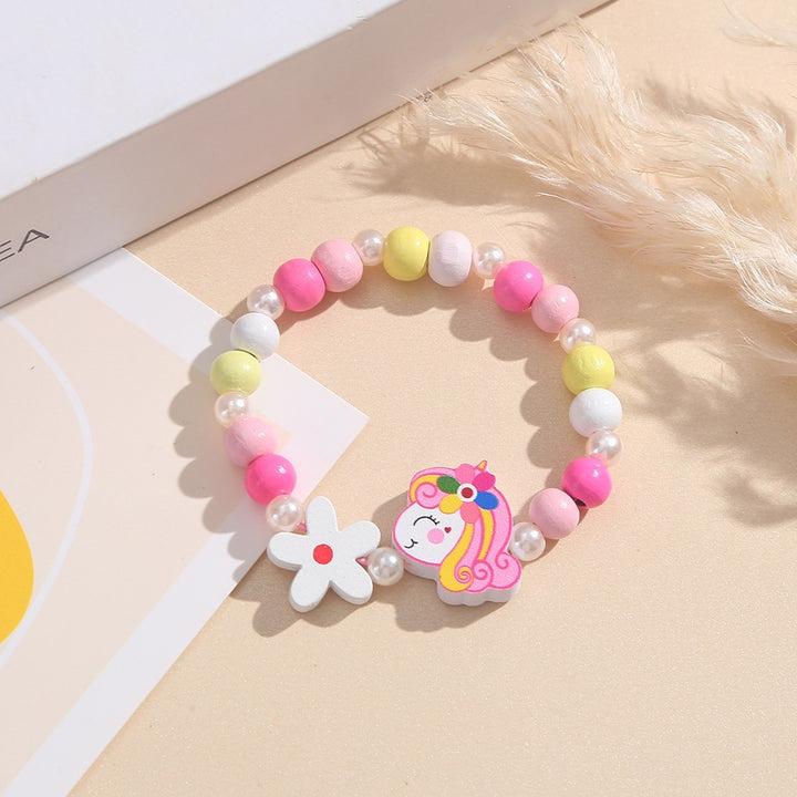 Verspieltes Kinderarmband mit Einhorn- und Blumenmotiv Karnz