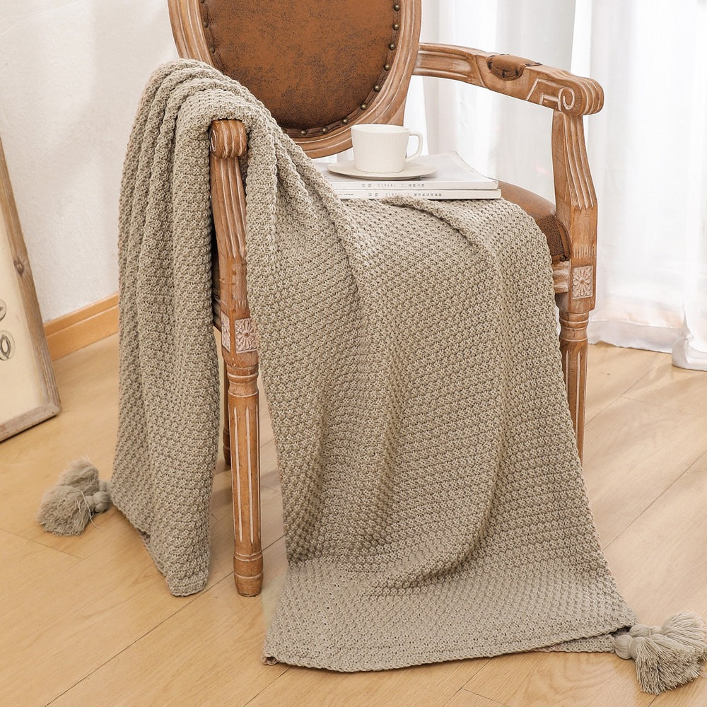 Strukturierte Strickwurfdecke