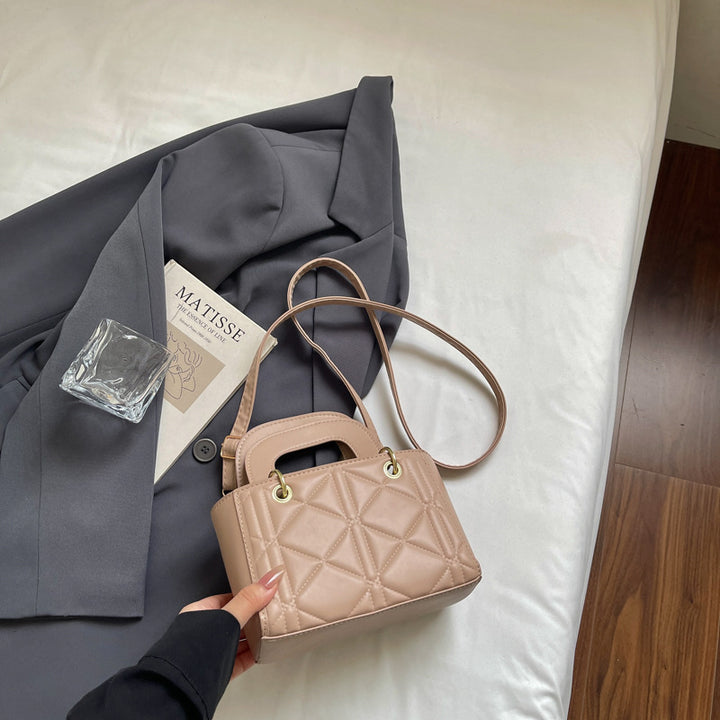 Gepolsterte Mini-Handtasche mit dualen Trageoptionen