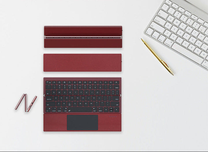 Kompakte kabellose Tastatur mit Touchpad Karnz