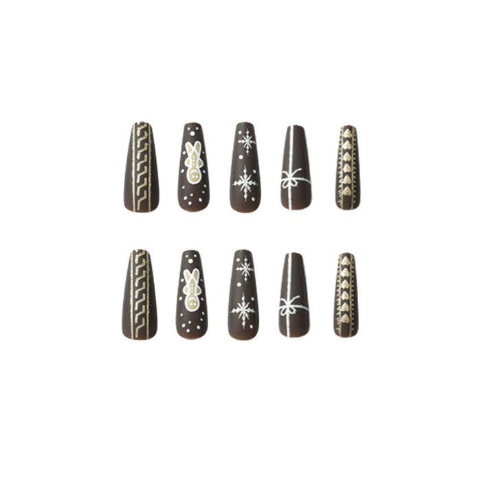 Künstliche Nagelkunst mit festlichem Lebkuchen-Design Karnz