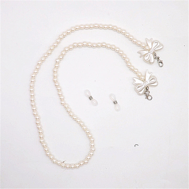 Elegante Perlen-Brillenkette mit Schleifenanhängern Karnz
