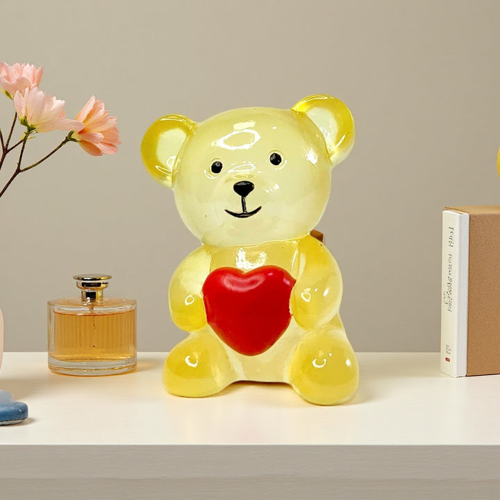 Dekorative Bärenfigur mit Herz Karnz