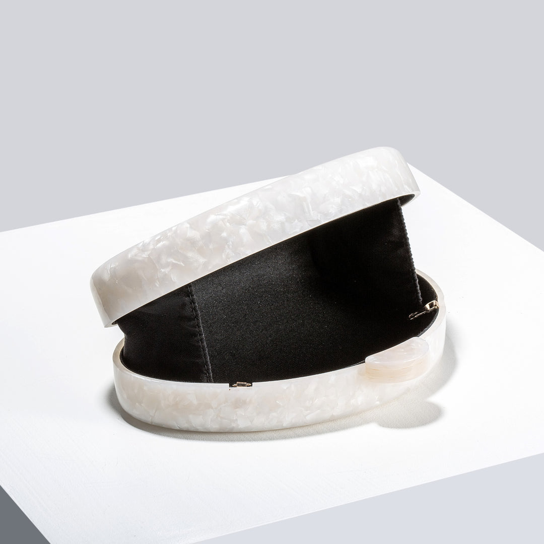 Künstlerische Wellenförmige Clutch