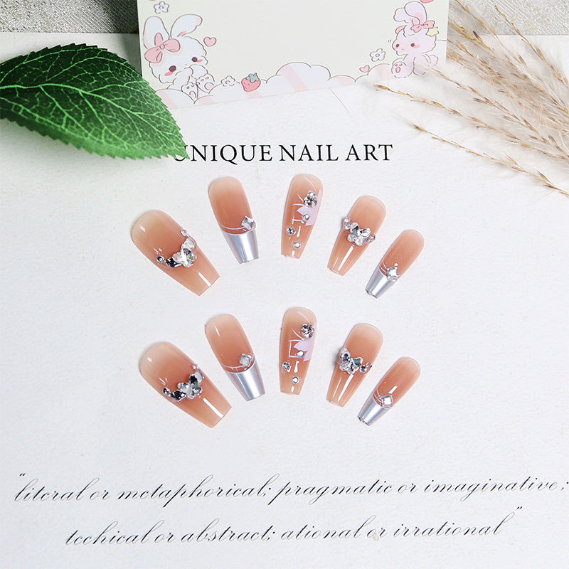 Kunstnagelset mit glamourösen Blüten- und Glitzerverzierungen Karnz