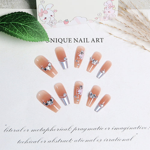 Kunstnagelset mit glamourösen Blüten- und Glitzerverzierungen Karnz