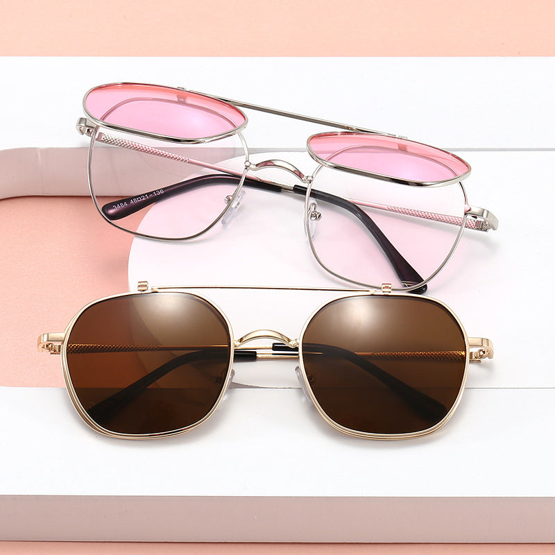 Damen geometrische Oversized-Sonnenbrille mit elegantem goldenem Rahmen Karnz