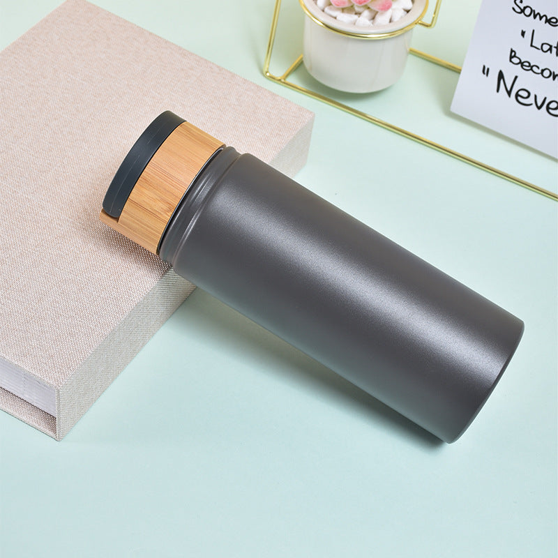 Damen stilvolle und vielseitige Edelstahl Trinkflasche mit Bambusverschluss Karnz