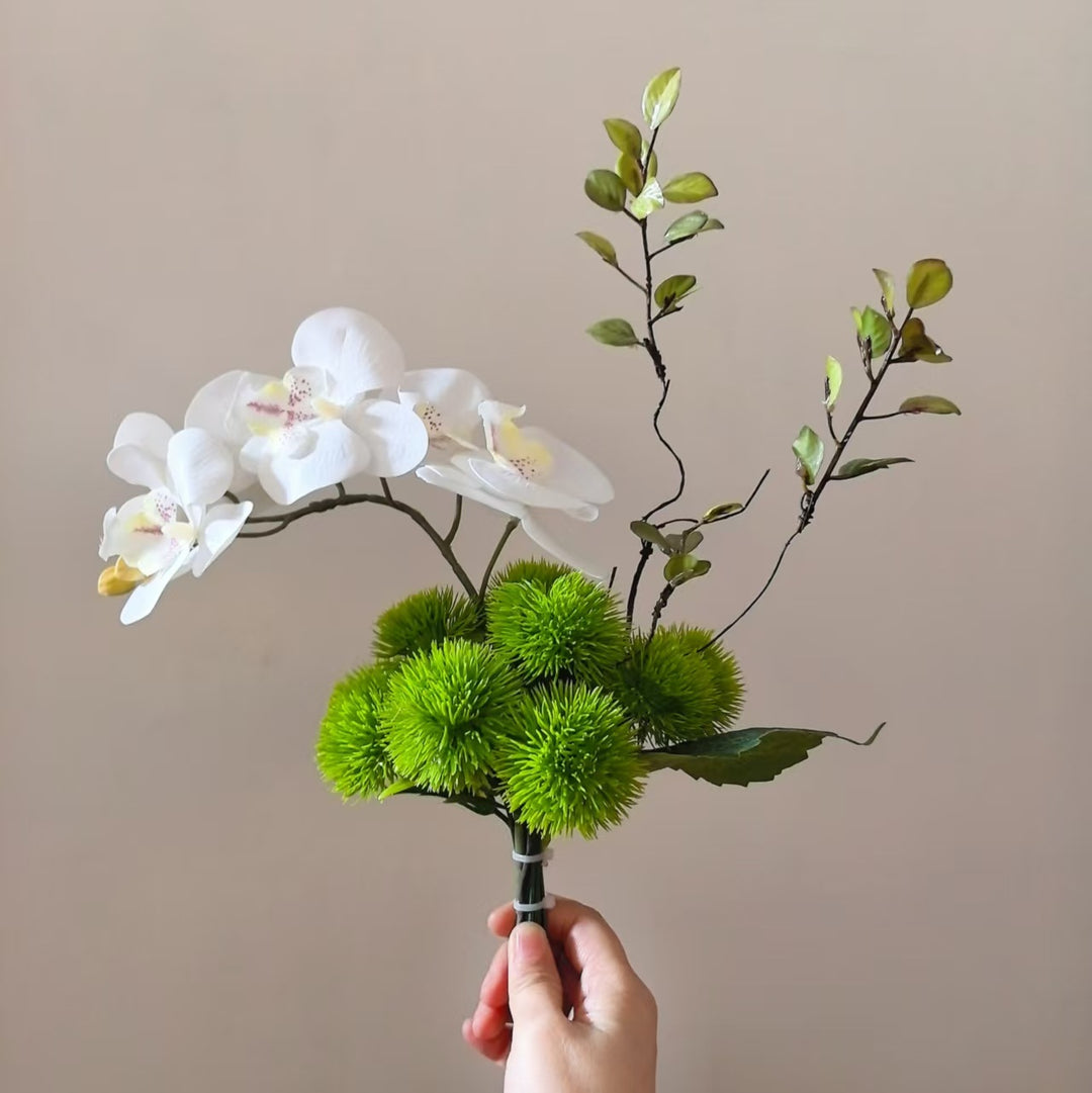 Elegante dekorative Orchideenarrangement